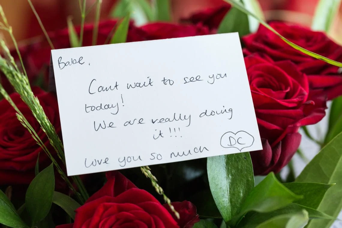 groom's message to his bride on the morning of their wedding, delivered with red roses