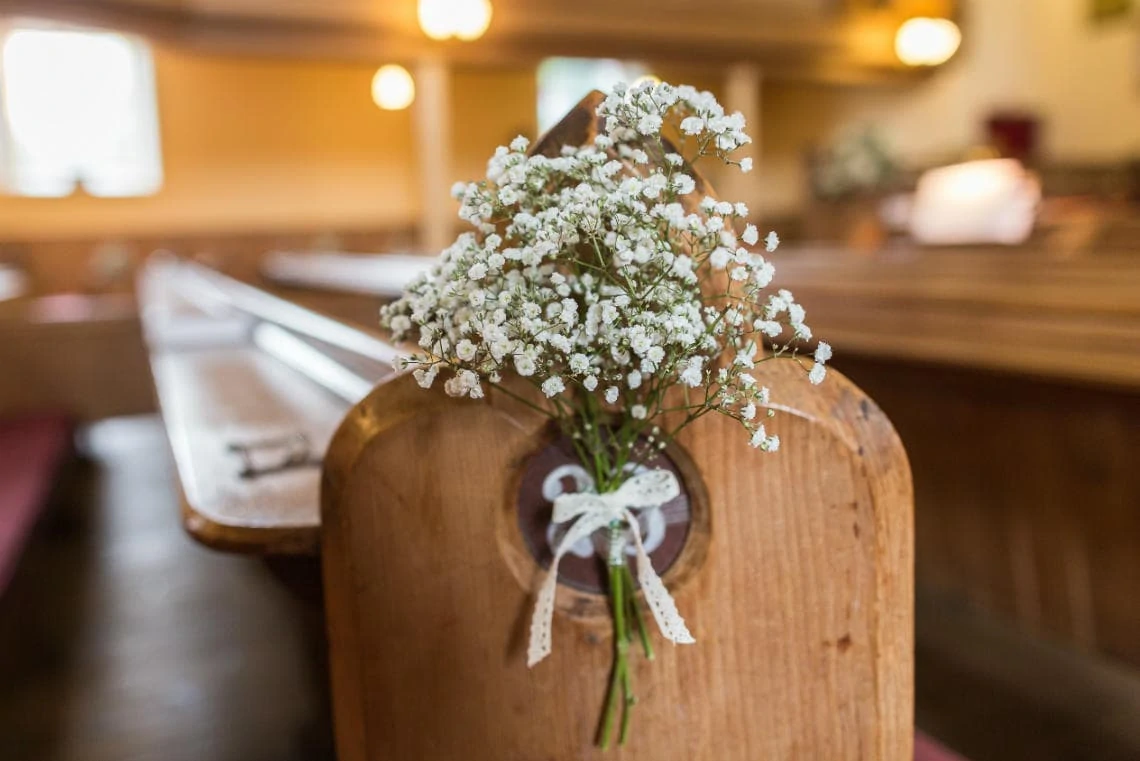 Gypsophila at the end of a pew in the church