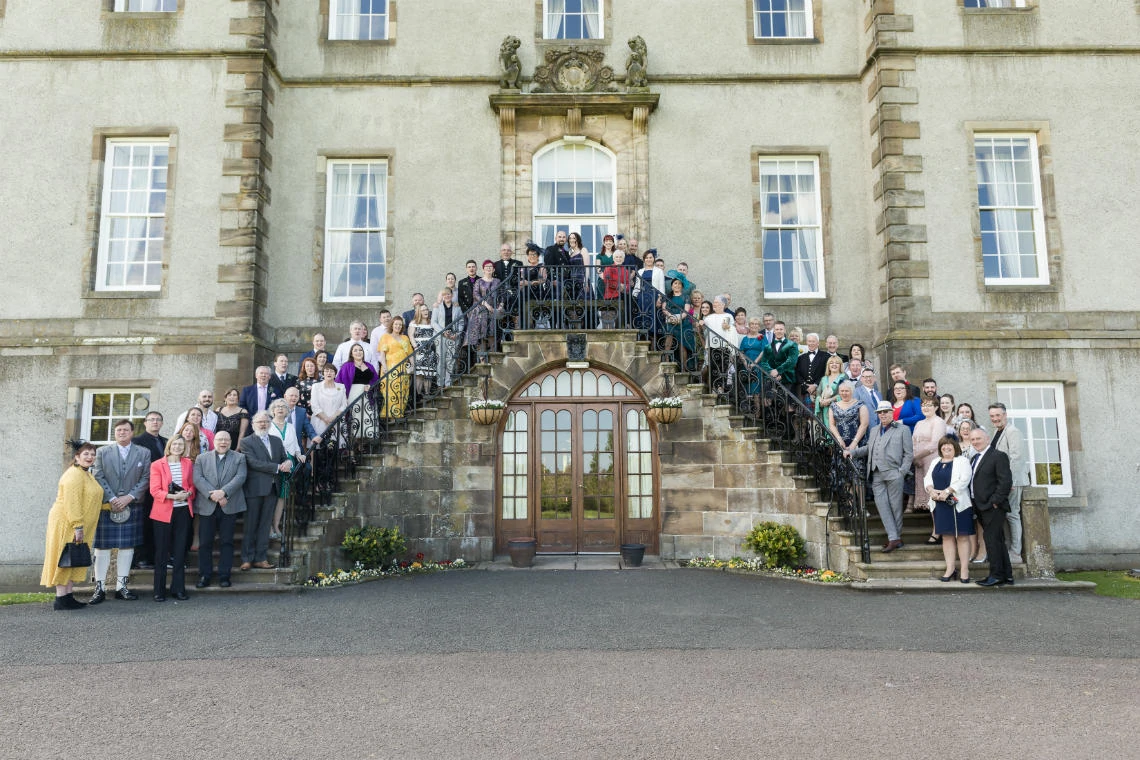 Golf course and grounds - formal group photo on the staircase