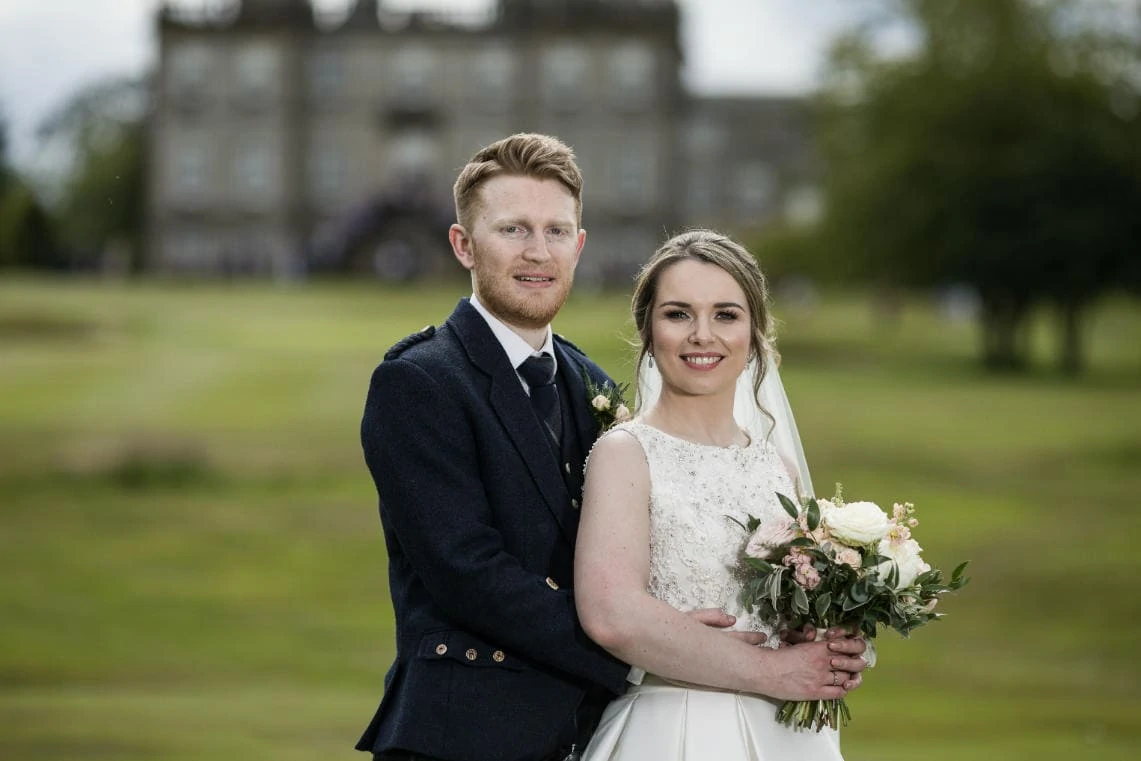 Golf course and grounds - newlyweds with Dalmahoy backdrop