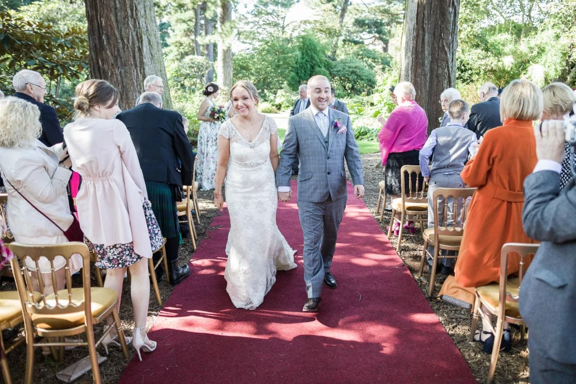 John Muir Grove newlywed recessional up the red carpet