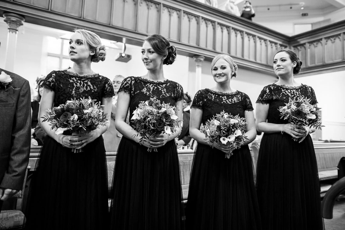 bridesmaids at the front of Liberton Kirk during ceremony