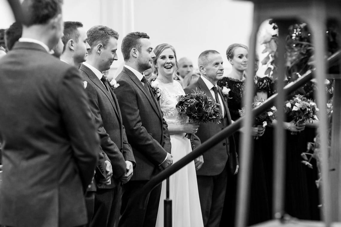 smiling bride during wedding ceremony at Liberton Kirk