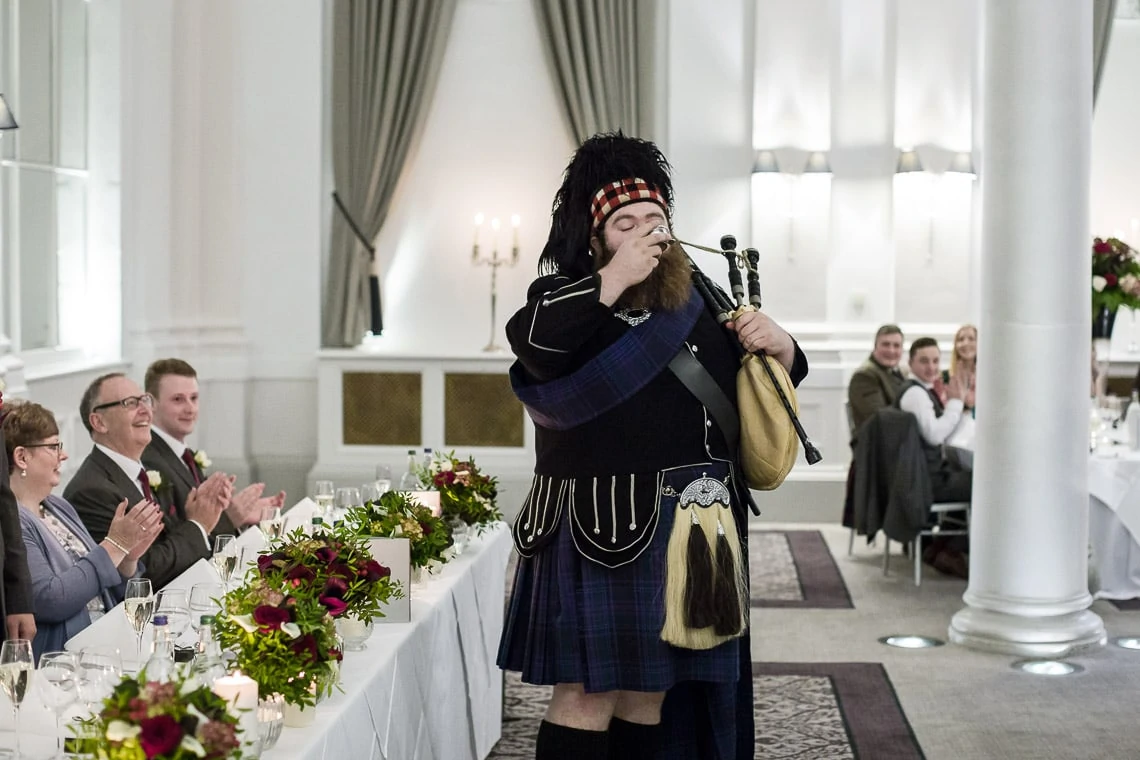 Piper toasts the newlyweds in the King's Hall