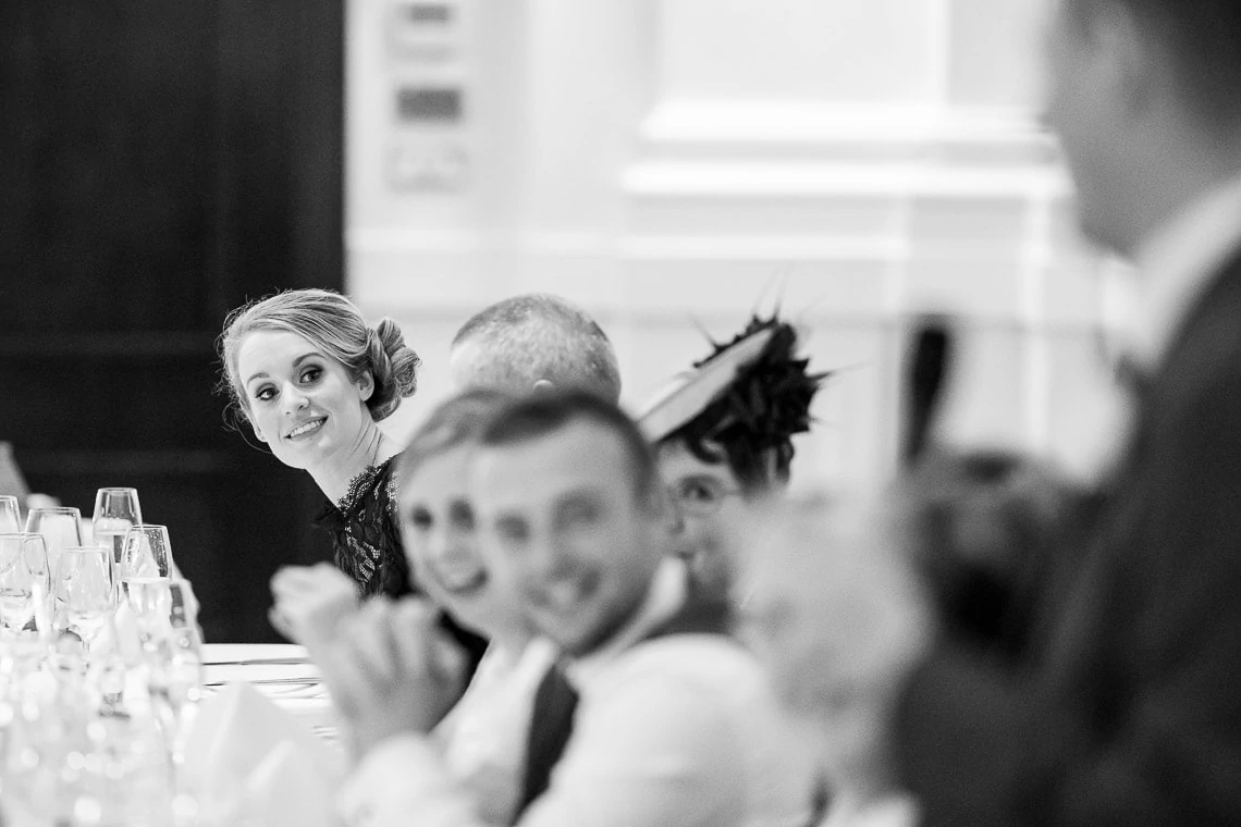 top table watching groom's speech in the King's Hall