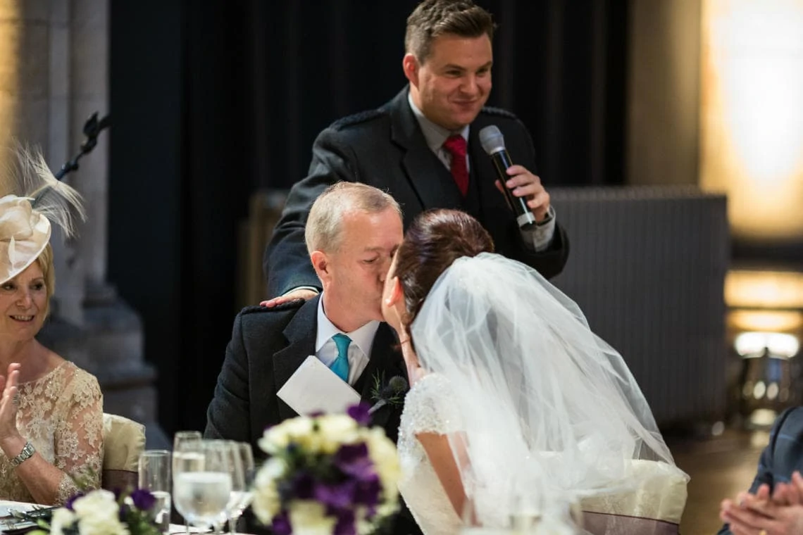 bride kisses father after his speech