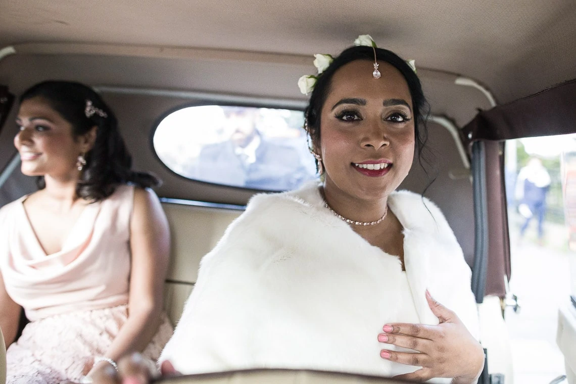bride inside in a Beauford car