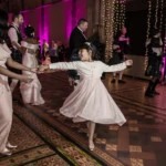 flower girl dancing during the evening party