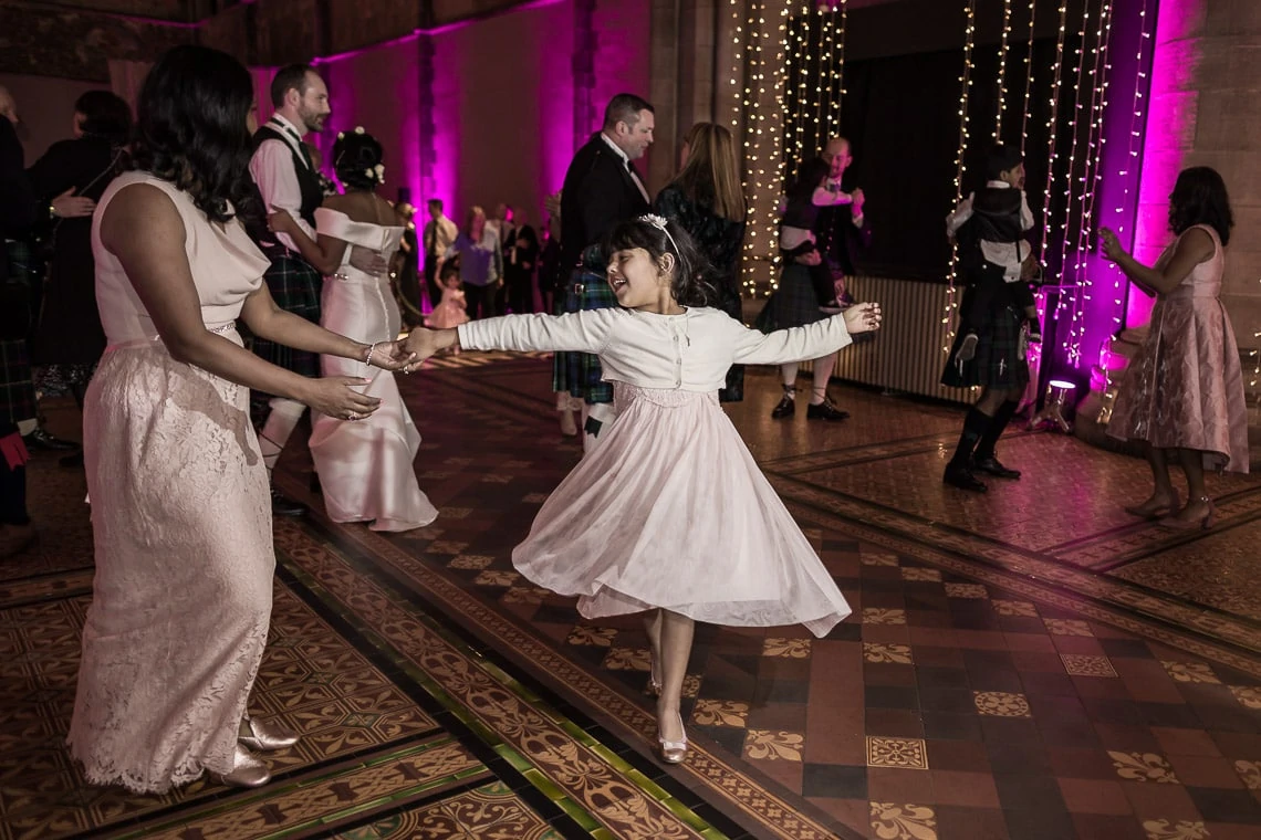 flower girl dancing during the evening party