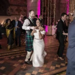 newlyweds dancing during the evening party