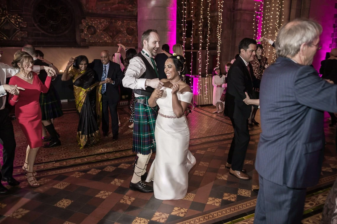 newlyweds dancing during the evening party
