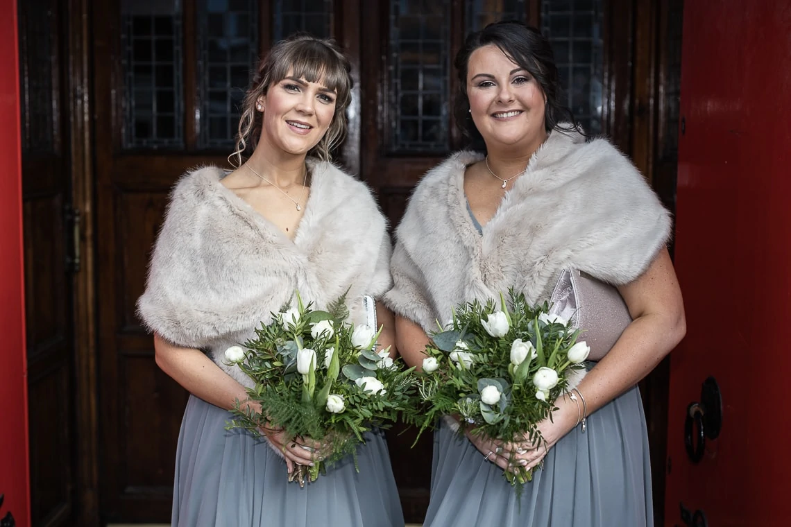 bridesmaids at the entrance to Mansfield Traquair