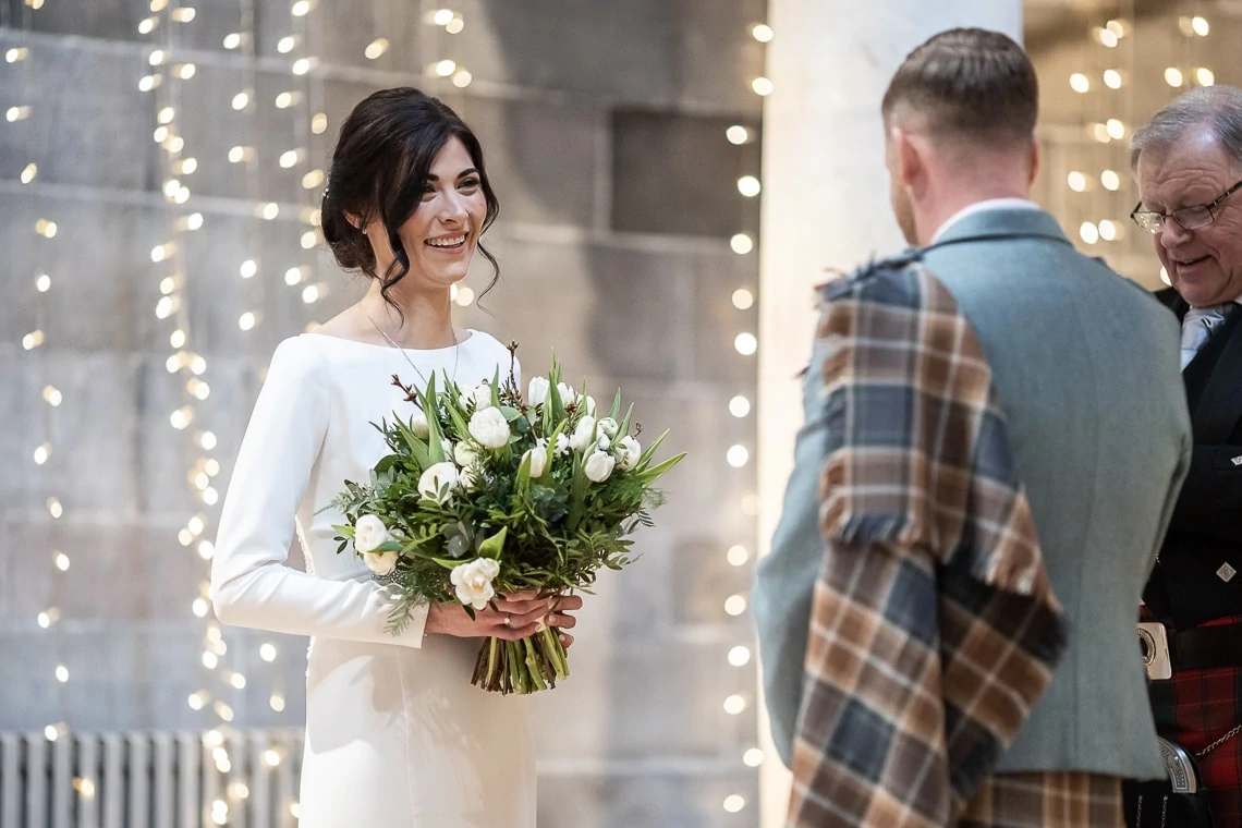 bride smiling at groom during Humanist ceremony