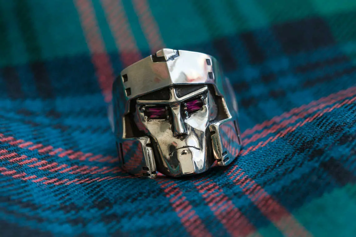 Close up of groom's Transformers wedding ring