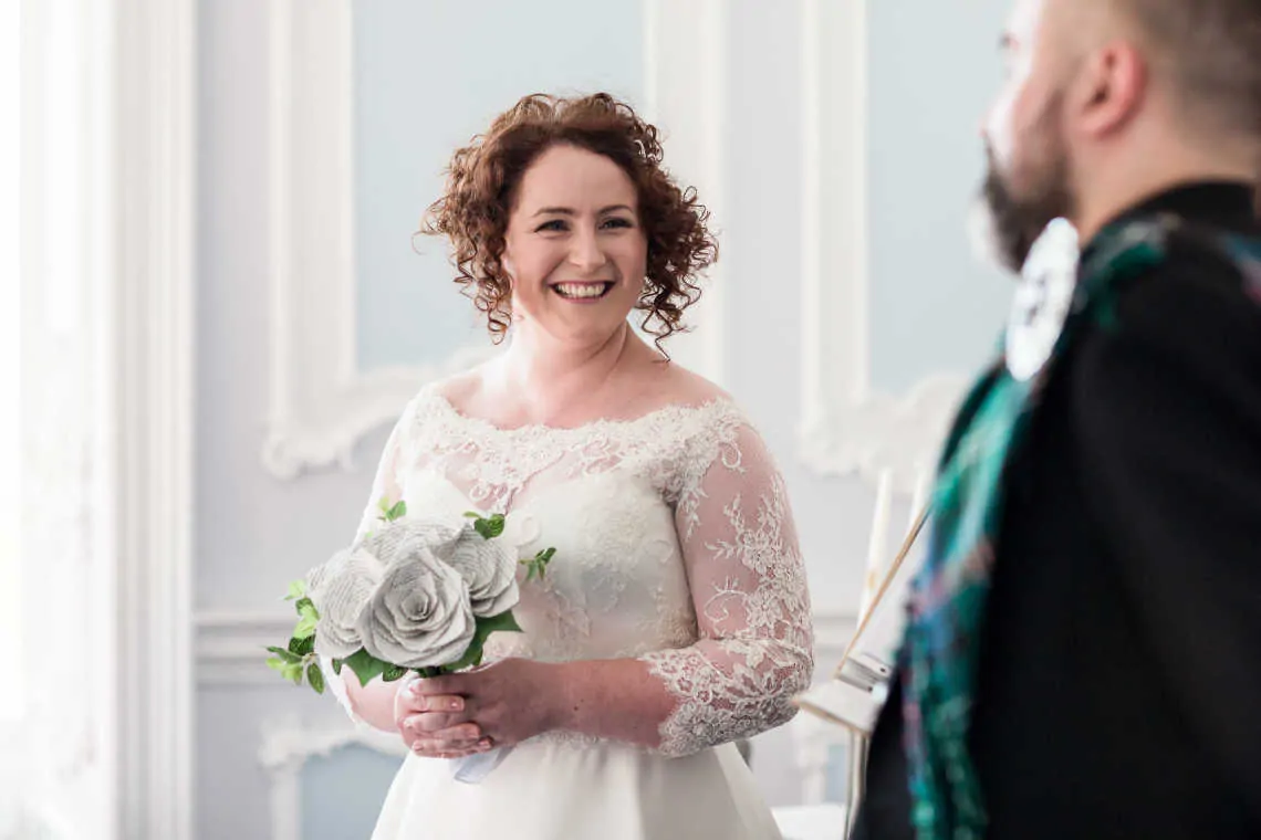 Bride smiling at groom at humanist marriage ceremony
