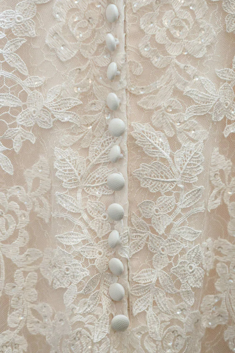 detailed photo of back of wedding dress