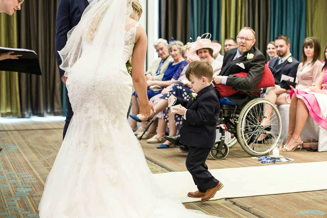 little boy is ring bearer at humanist ceremony