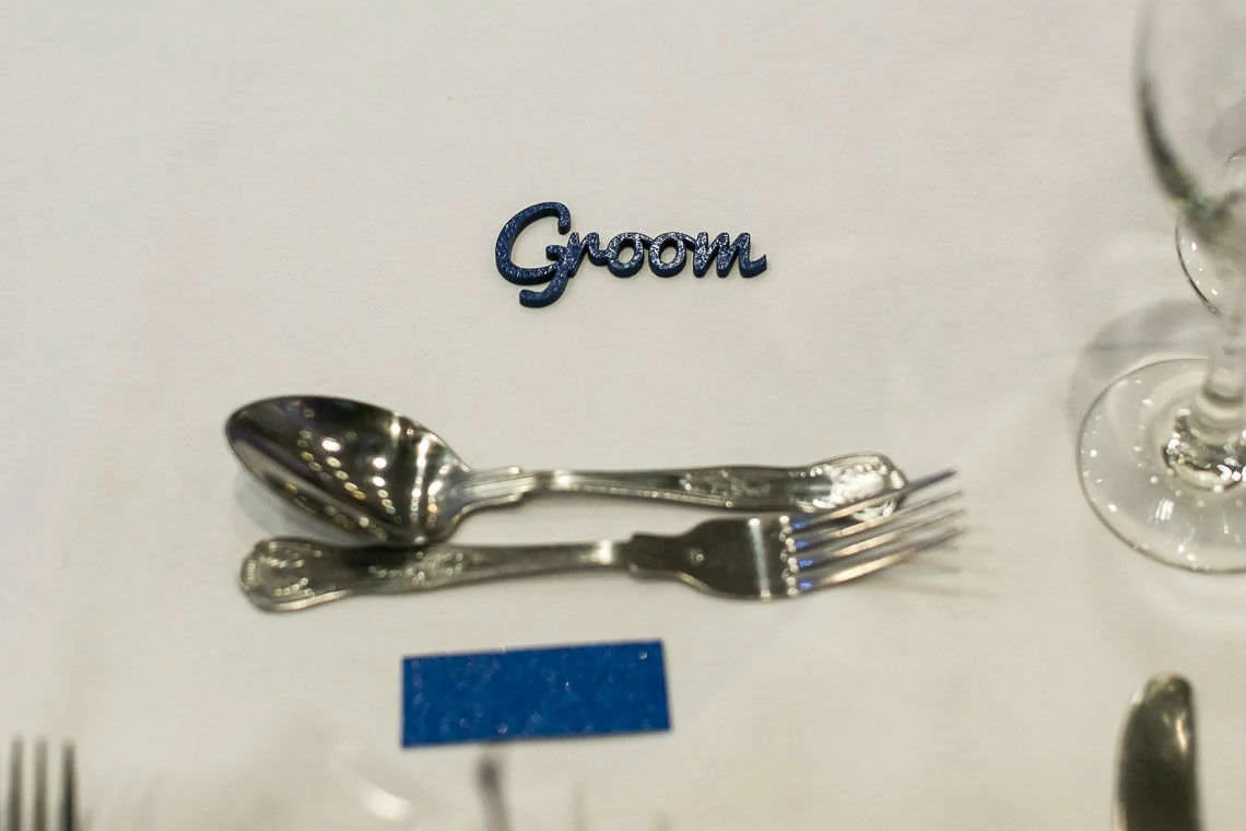 groom's wooden place setting