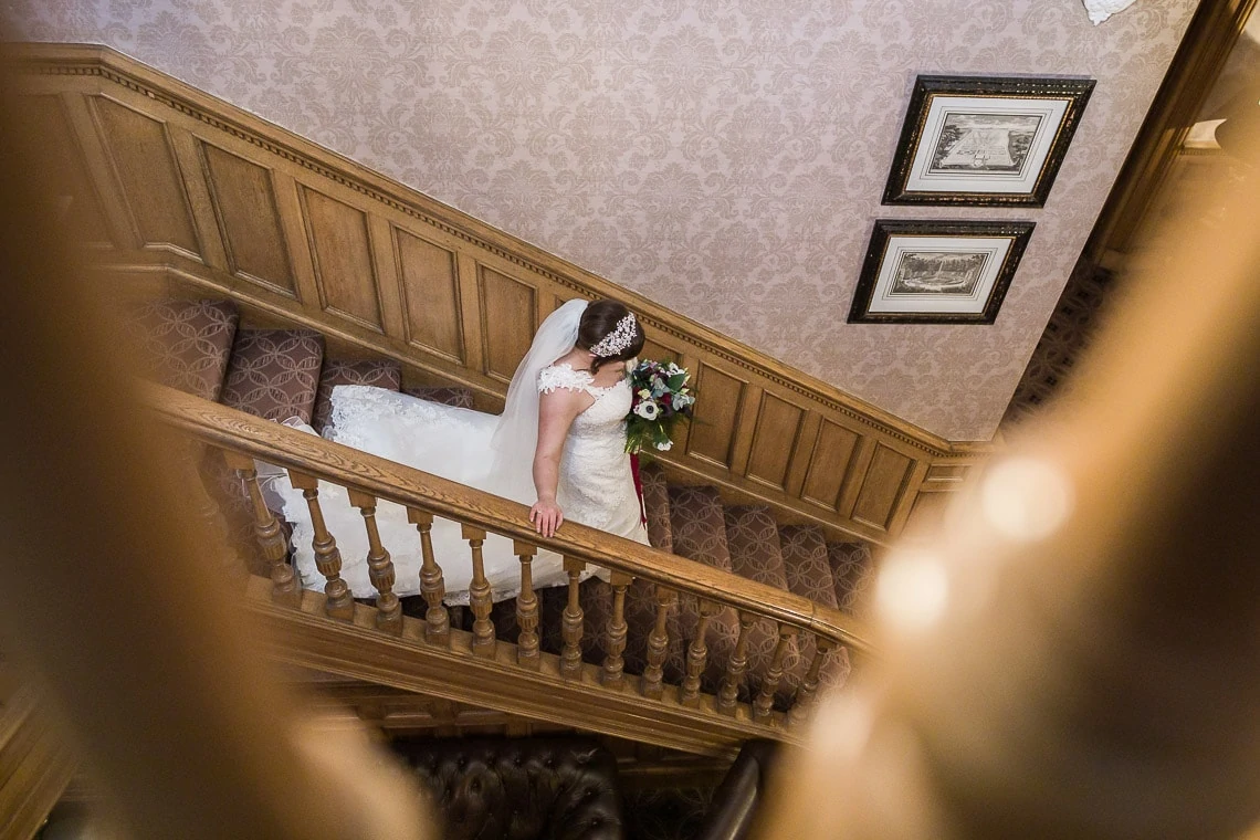 bride walking down the staircase
