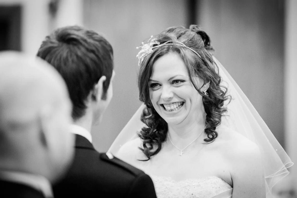 bride smiling at the groom