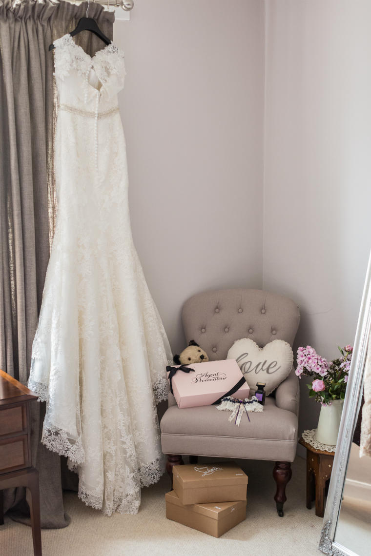 bride's wedding dress, garter and perfume