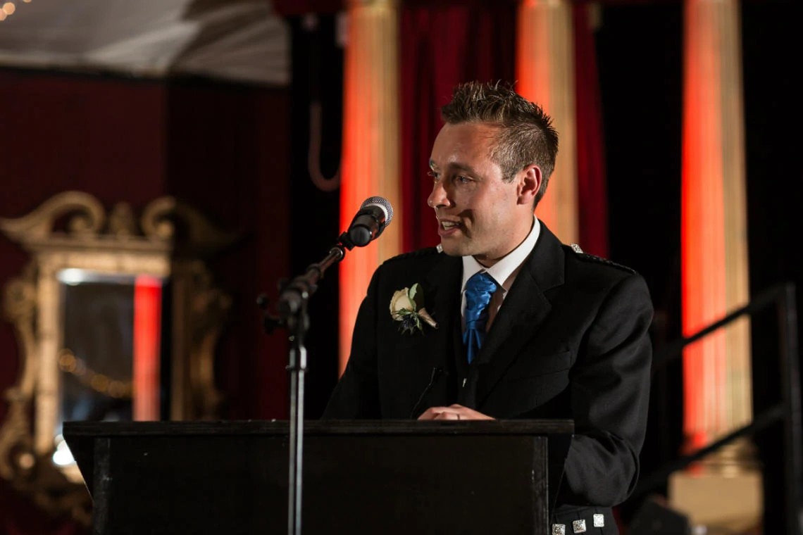close up of the groom during his speech in the Stables Ballroom