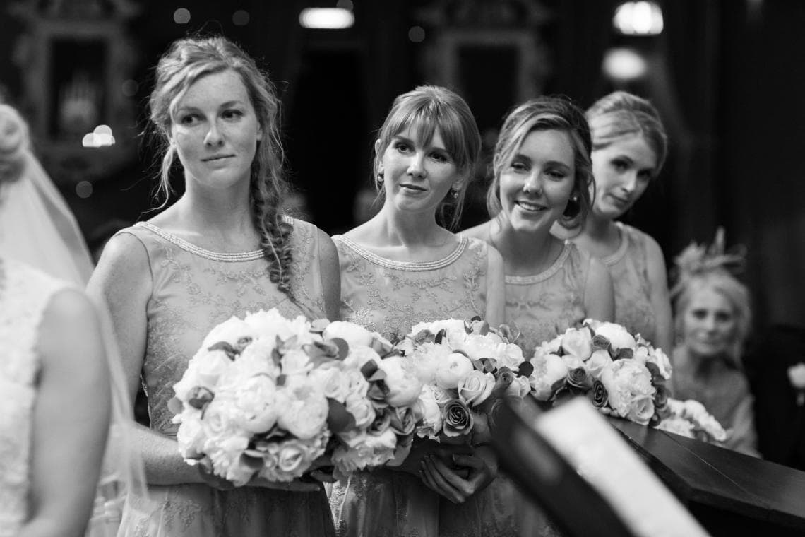 bridesmaids watching the ceremony in the Stables Ballroom