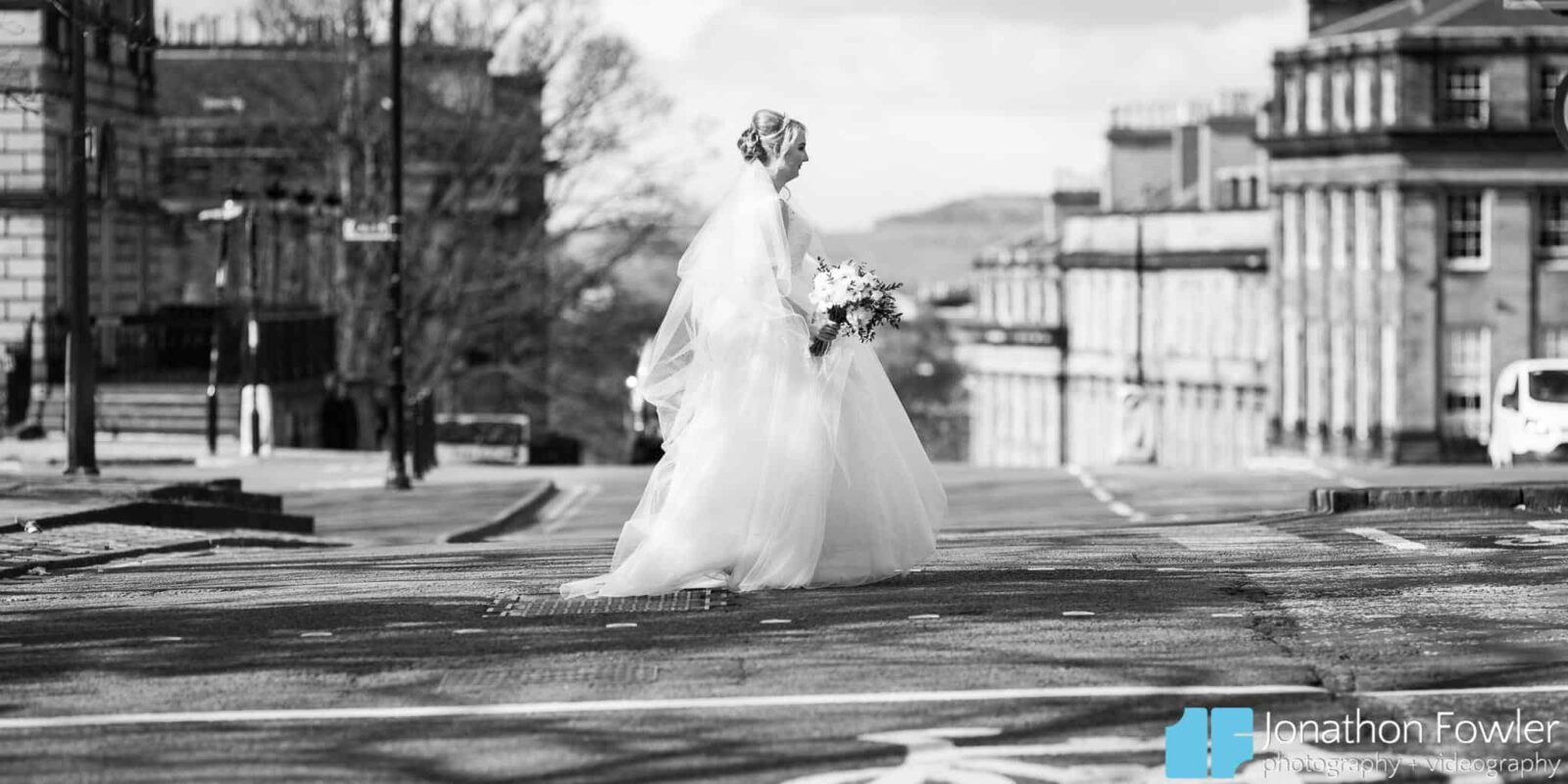 Roxburghe Hotel Edinburgh wedding bride crossing the road