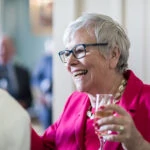 Royal College Of Physicians Edinburgh Wedding photo of lady smiling at drinks reception