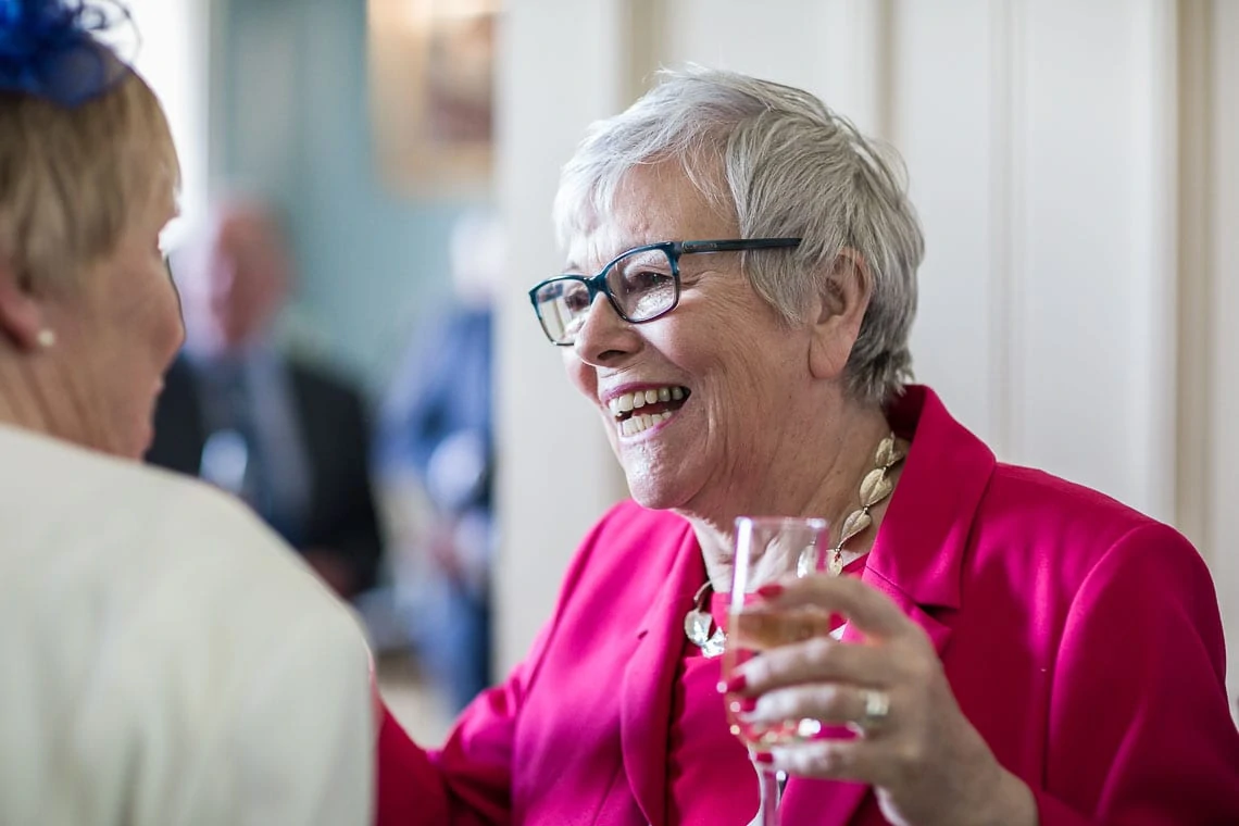 Royal College Of Physicians Edinburgh Wedding photo of lady smiling at drinks reception