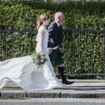 Royal College Of Physicians Edinburgh Wedding - Gill and Iain walking along Queen Street