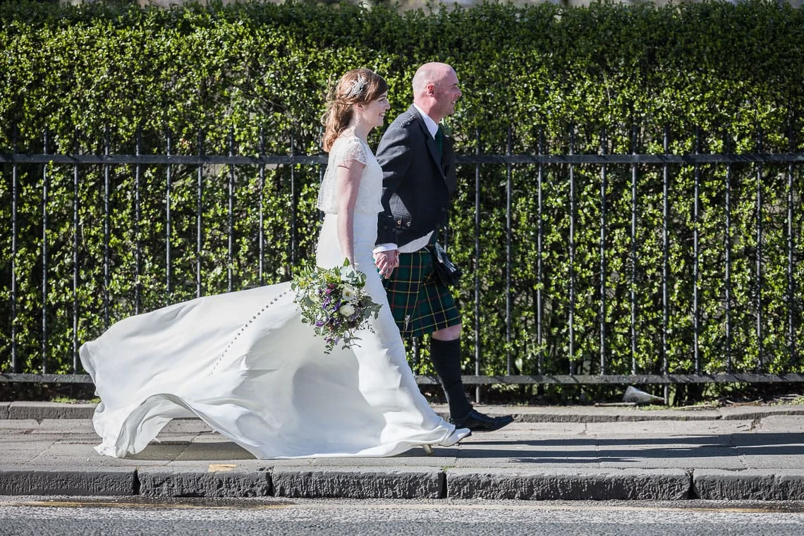 Royal College Of Physicians Edinburgh Wedding - Gill and Iain walking along Queen Street