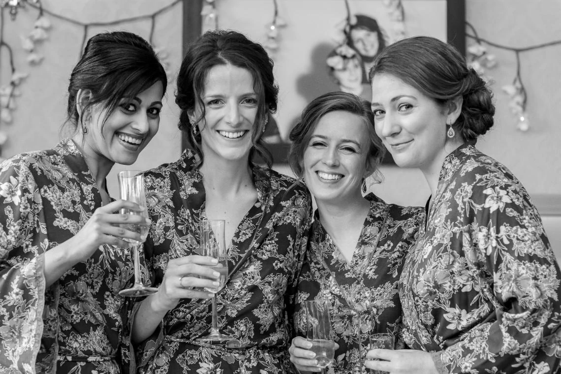 bride and bridesmaids during the pre-ceremony preparations