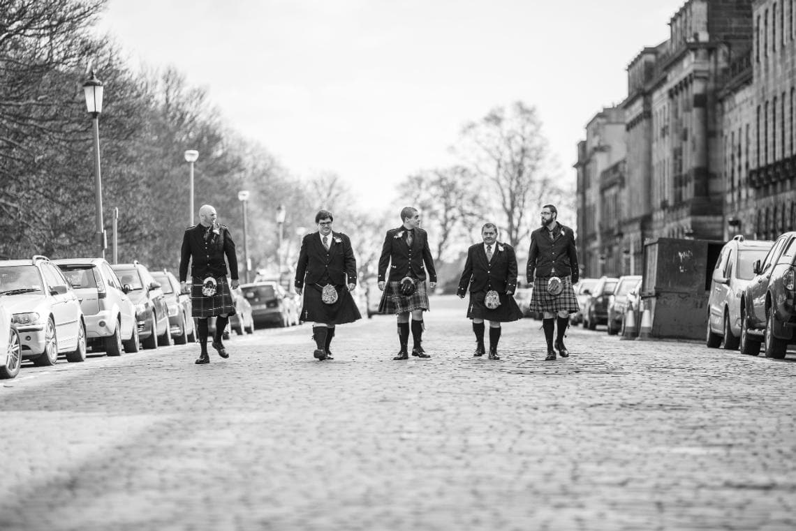 groom and the boys walking along Royal Terrace Edinburgh