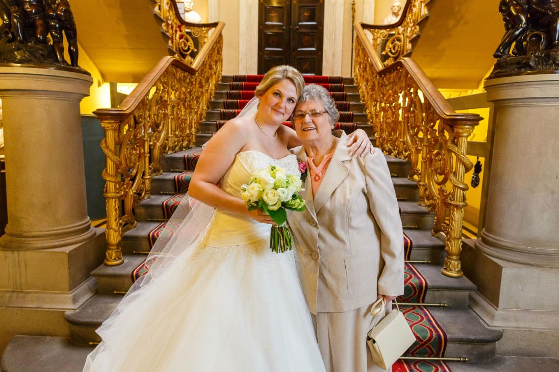 bride and grandmother on the grand staircase