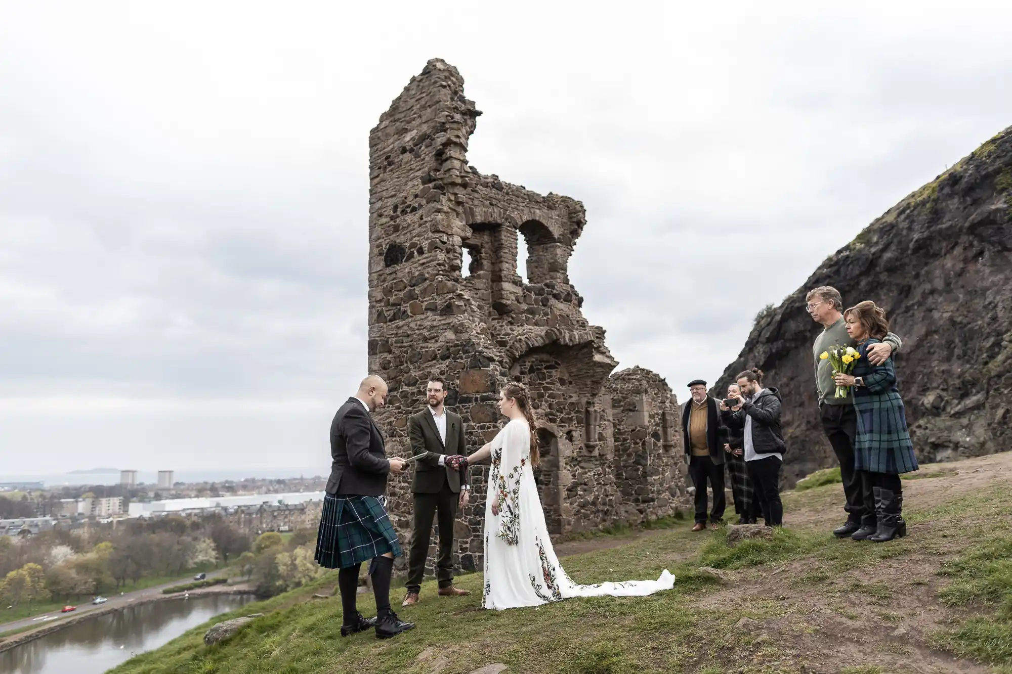 tying the knot with ruin backdrop