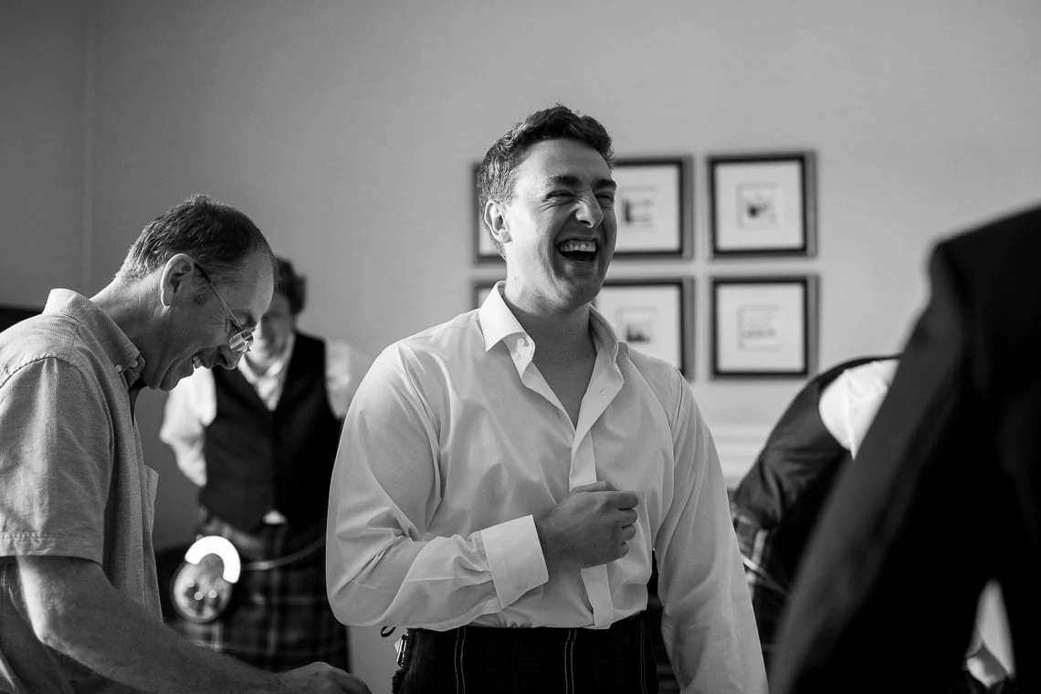 groom Andy laughing