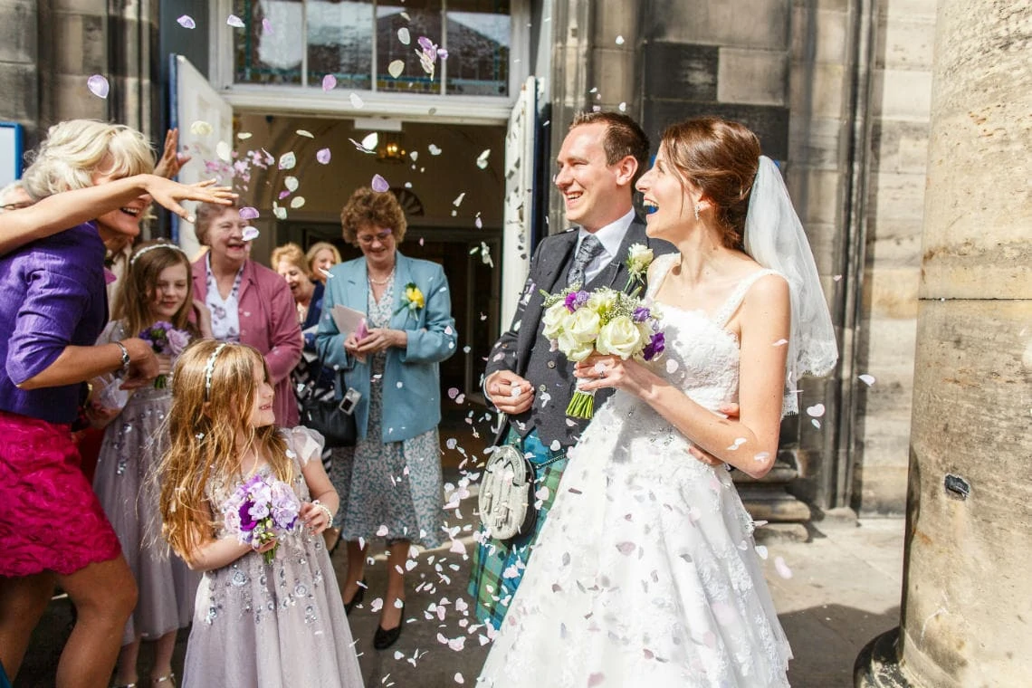 newlyweds confetti shower outside St Andrew's and St George's West Church of Scotland