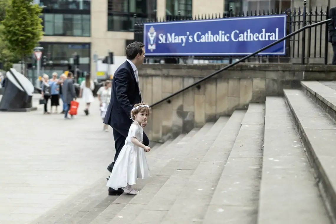 Flower girl arriving at the church