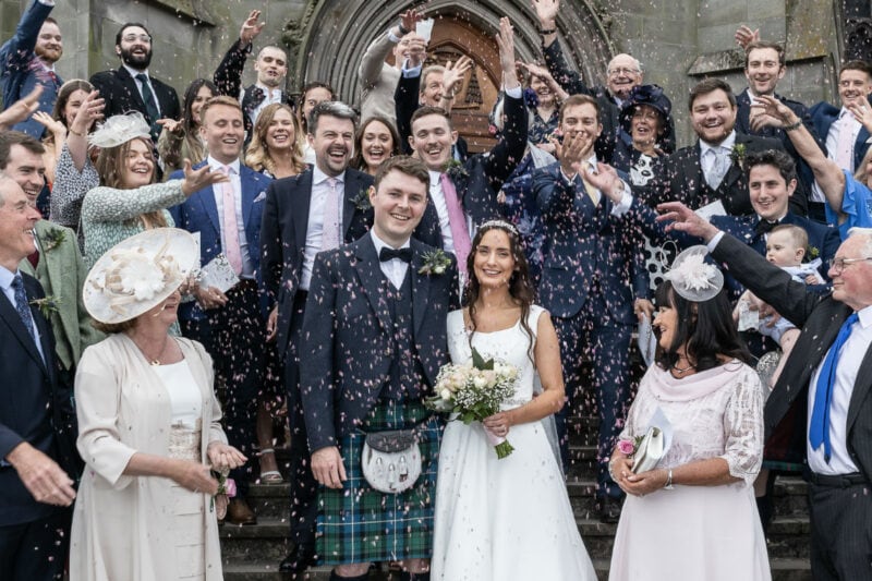 Group confetti photo outside St Mary's Cathedral