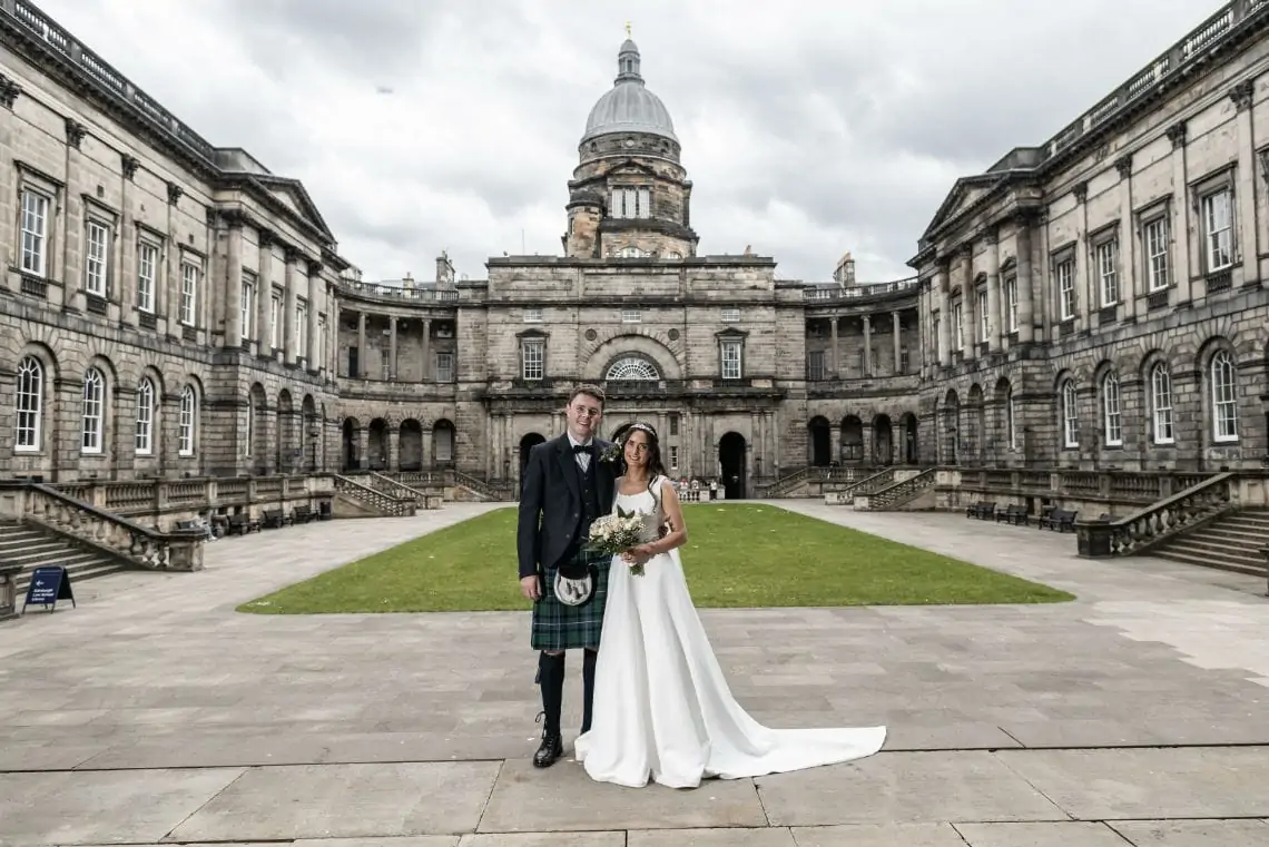 Bride and Groom in the courtyard of the Old College