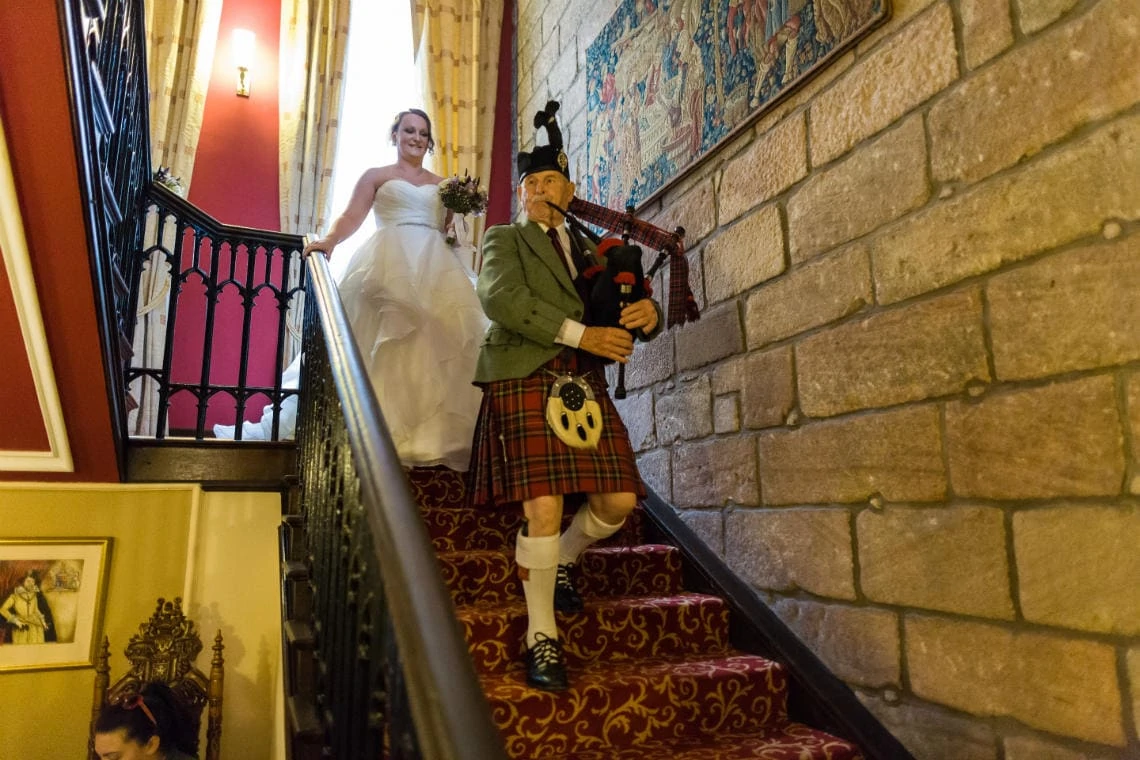 Staircase and landing - bridal procession led by piper