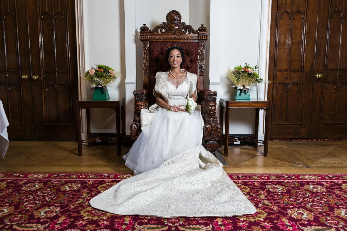 Staircase and landing - bride smiling on the throne