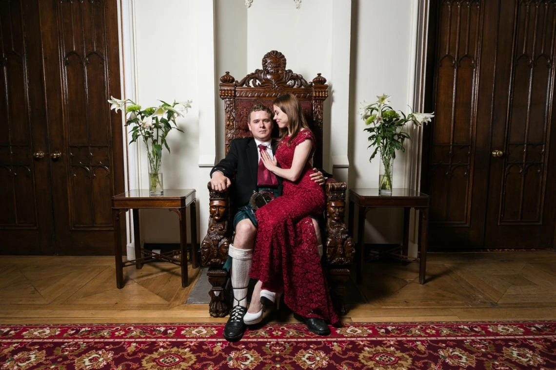 Staircase and landing - newlyweds embracing on the throne