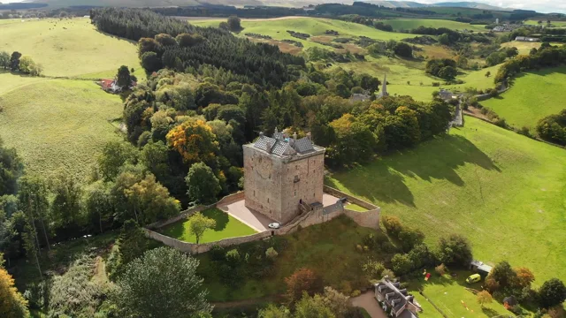 Videographer at Borthwick Castle filming Chris and Lee's same-sex marriage celebration - drone shot