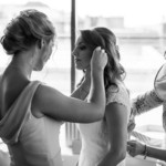 bridesmaid helping bride in the Forthview Suite