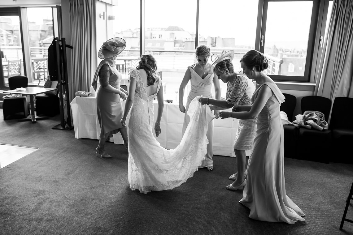 bridesmaids and bride almost ready in the Forthview Suite