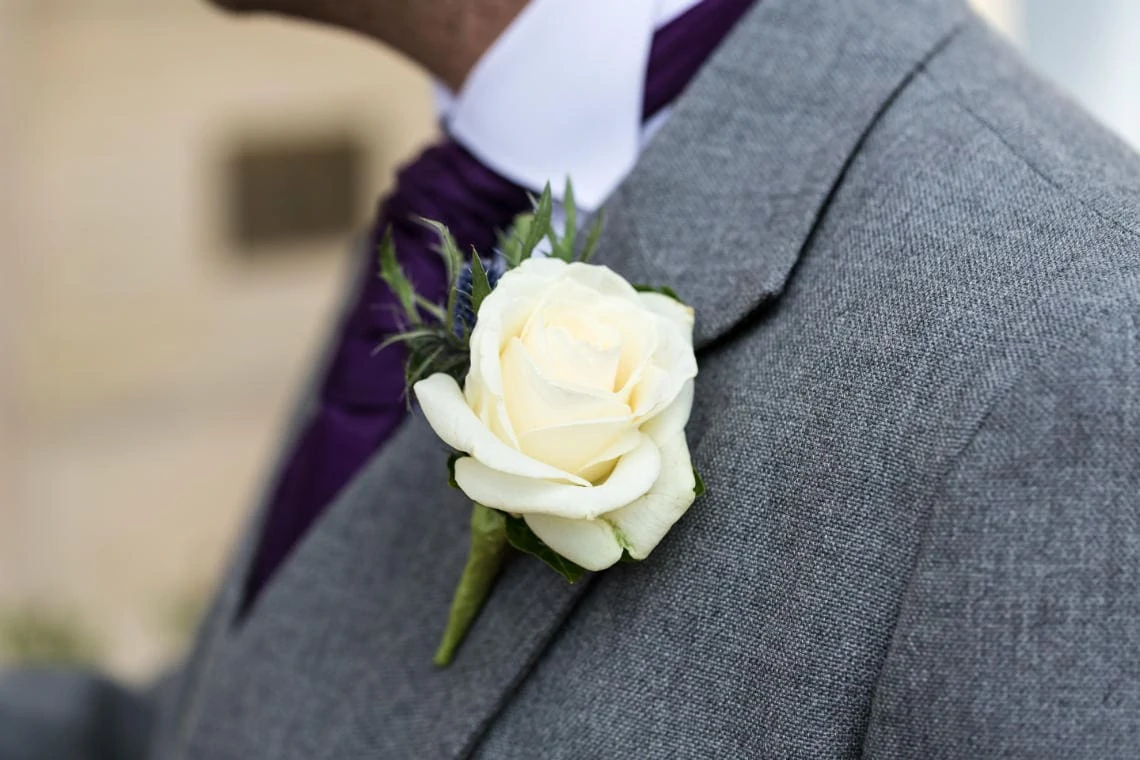 Groom's yellow rose buttonhole