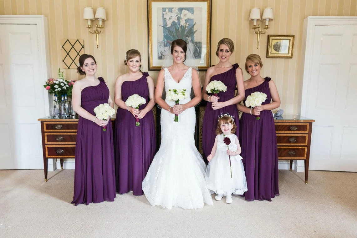 Bride, bridesmaids and flower girl