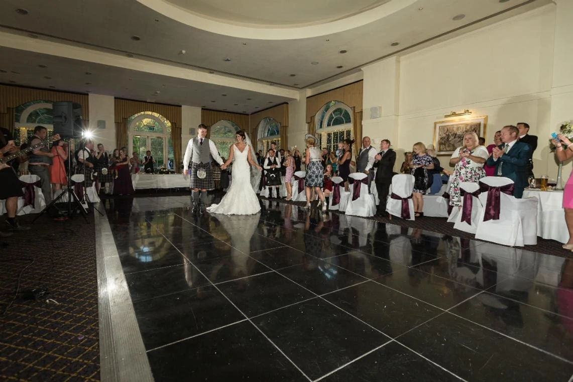 newlyweds take to the Ballroom dance floor for their first dance